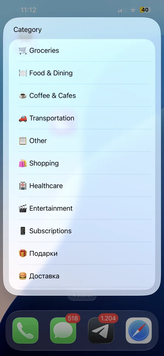 Category list appearing over the iPhone home screen right after an Apple Pay payment